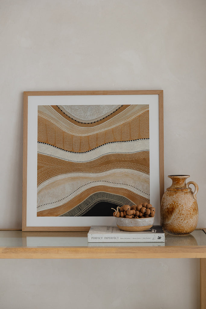 Of Earth’ Aboriginal artwork by Wiradjuri artist Lauren Freestone, inspired by sandstone cliffs on Wiradjuri and Awabakal Country with textured layers and earthy tones.