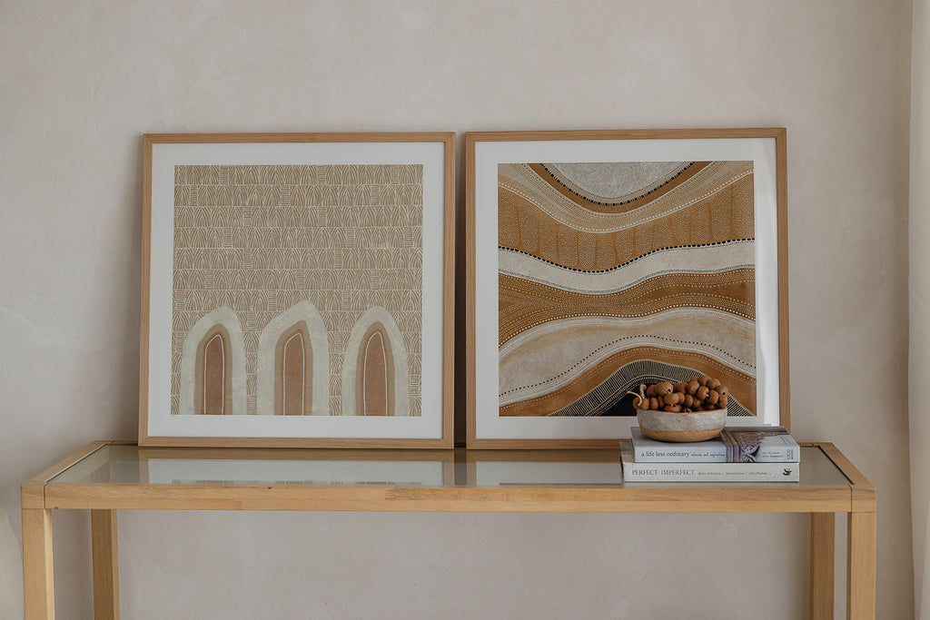 Aboriginal artwork by Wiradjuri artist Lauren Freestone, featuring mustard flame-like shapes symbolising generations, family, and ancestral spirit